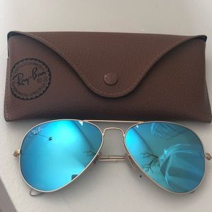 Rayban aviator. Blue tint. Gold metal.